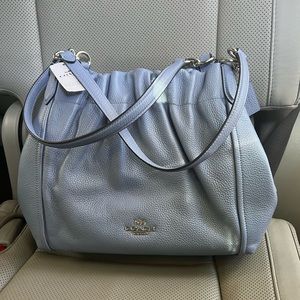 Light blue coach purse.